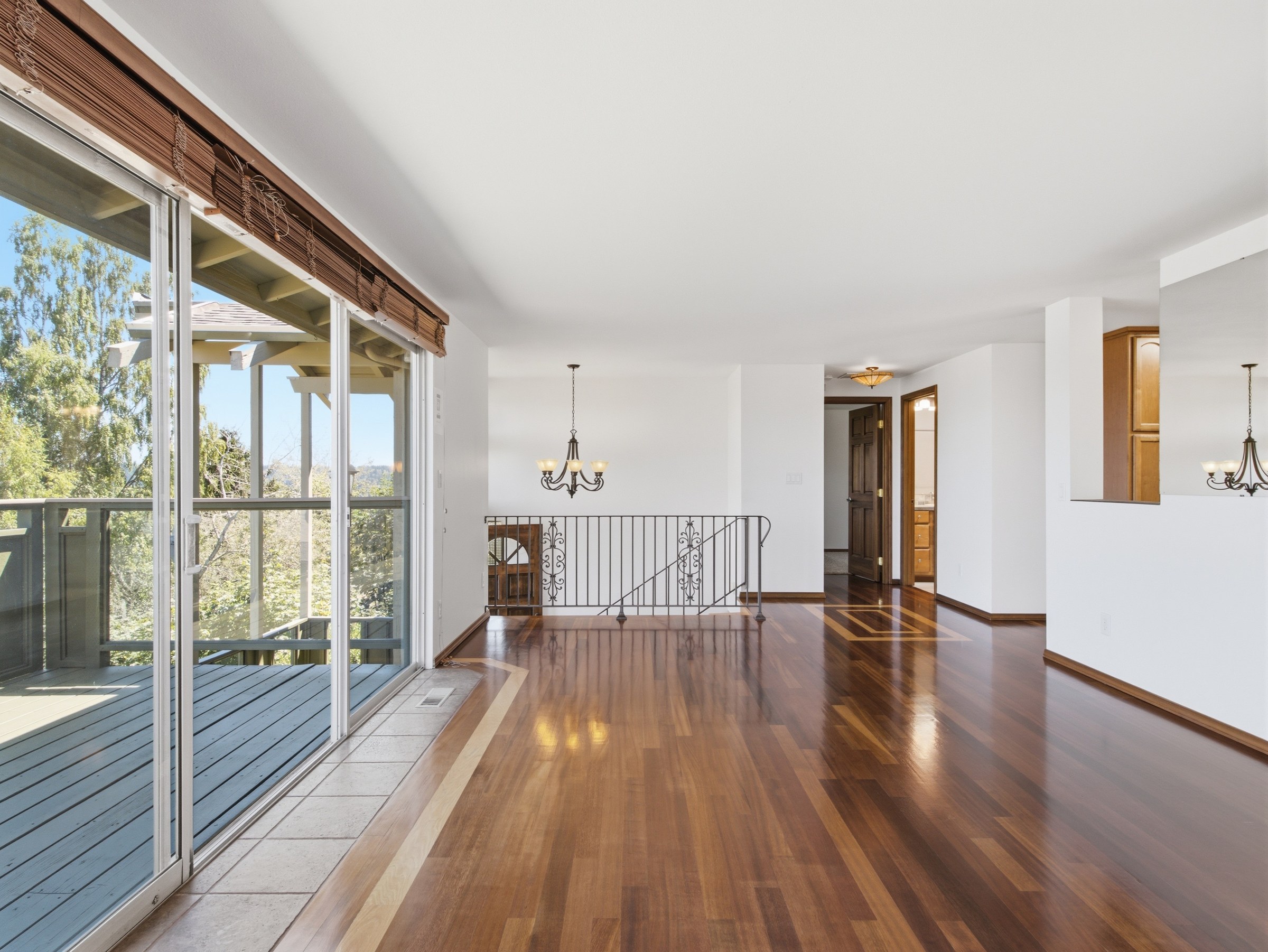 Open-plan living area showing room flow and deck access